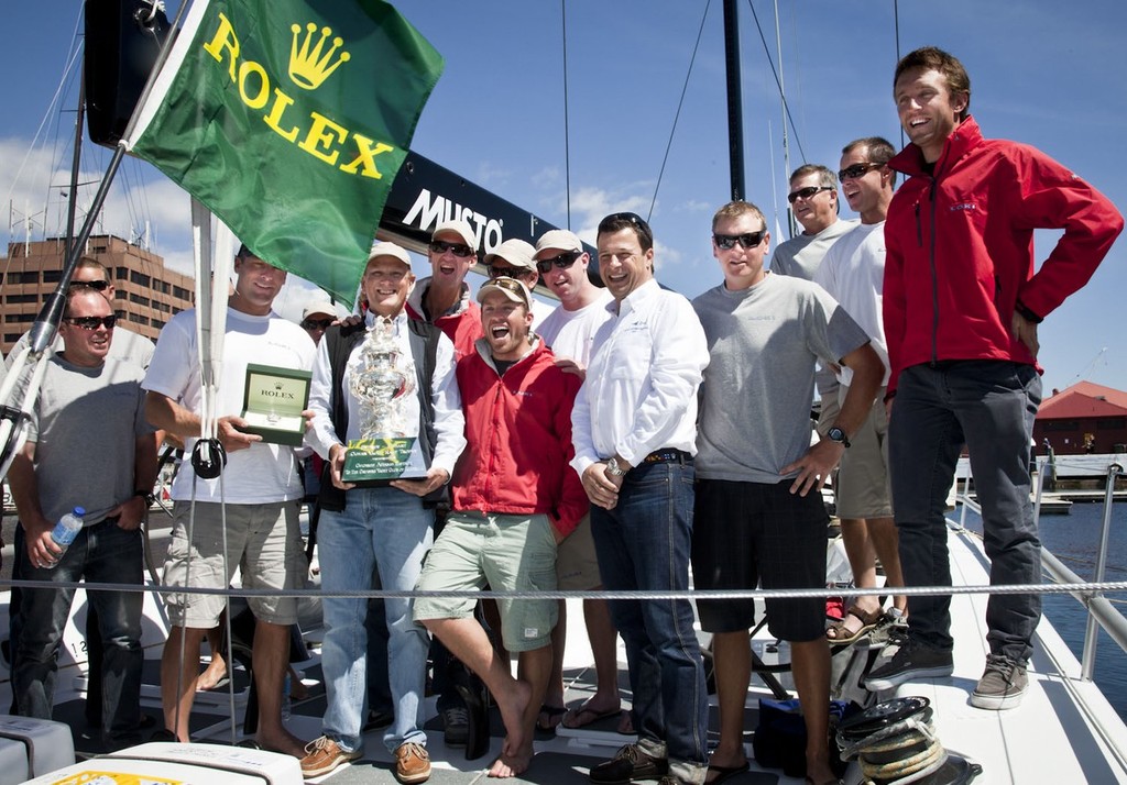 Loki crew are presented with Tattersall’s Cup and Rolex Yacht-Master timepiece by Patrick Boutellier (Rolex Australia) and Commodores Graham Taplin (RYCT) and Garry Linacre (CYCA). ©  Rolex/Daniel Forster http://www.regattanews.com